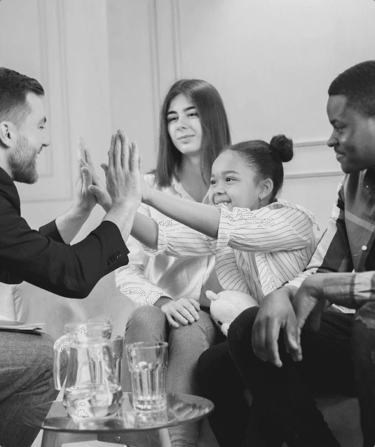 A family celebrating a successful trade